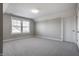 Neutral bedroom with carpet, window and door leading to other areas of the home at 2274 Finchley Rd, Carmel, IN 46032