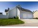 Spacious two-car garage with a driveway providing ample parking and storage at 2274 Finchley Rd, Carmel, IN 46032