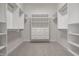 Spacious walk-in closet with custom shelving and drawers for optimal storage at 2274 Finchley Rd, Carmel, IN 46032