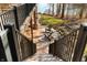 Backyard stairs leading to a lower patio level, providing access to outdoor relaxation spots at 2688 S Oscar Ct, Morgantown, IN 46160
