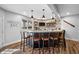 Basement bar area featuring stone accents, concrete countertop, and stylish pendant lighting at 2688 S Oscar Ct, Morgantown, IN 46160