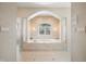 Luxurious bathroom featuring a large soaking tub and elegant architectural details at 2688 S Oscar Ct, Morgantown, IN 46160