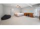 Bright, open bedroom with carpet, natural light, and a bonus desk area at 2688 S Oscar Ct, Morgantown, IN 46160