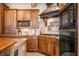 Beautiful kitchen features custom cabinets, granite countertops, and modern appliances at 2688 S Oscar Ct, Morgantown, IN 46160