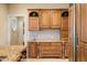Kitchen features custom cabinetry, granite countertops, and ample storage space at 2688 S Oscar Ct, Morgantown, IN 46160