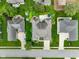 Overhead view of a well-maintained residential area with lush trees and a swimming pool in the backyard at 286 S Woodridge Dr, Pittsboro, IN 46167