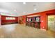 Spacious basement features a wet bar, ample seating, and bright, modern lighting at 286 S Woodridge Dr, Pittsboro, IN 46167