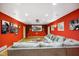 Finished basement is set up as a screening room with large sectional and projector at 286 S Woodridge Dr, Pittsboro, IN 46167
