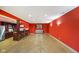 Finished basement with full bar, stainless fridge, and seating with a movie theater theme at 286 S Woodridge Dr, Pittsboro, IN 46167