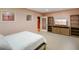 This bedroom features cozy carpet, built-in shelving, and decorative stained glass windows at 286 S Woodridge Dr, Pittsboro, IN 46167