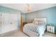 Bright bedroom with a large window, plush carpeting, a queen bed and ample closet space at 286 S Woodridge Dr, Pittsboro, IN 46167