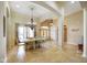 Bright dining area features tile floors, a chandelier, and neutral paint colors at 286 S Woodridge Dr, Pittsboro, IN 46167