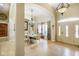 Grand foyer with tile floor, chandelier and bright entry door at 286 S Woodridge Dr, Pittsboro, IN 46167