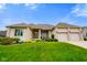 Beautiful brick home with well-manicured lawn and two-car garage at 286 S Woodridge Dr, Pittsboro, IN 46167
