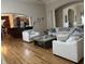 Spacious living room with wood floors, ample seating and an open concept design at 286 S Woodridge Dr, Pittsboro, IN 46167
