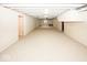 Large basement featuring white walls and ceilings, carpet flooring, and plenty of space at 2888 Prairie Stream Way, Columbus, IN 47203