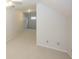 Spacious basement with white walls and light carpet; can be used for multiple purposes at 2888 Prairie Stream Way, Columbus, IN 47203