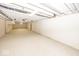 Spacious basement featuring white walls and ceilings, carpet flooring, and utilities at 2888 Prairie Stream Way, Columbus, IN 47203