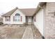 Charming home with a brick and siding exterior with manicured lawn, showcasing curb appeal at 2888 Prairie Stream Way, Columbus, IN 47203