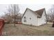 Exterior of home with back deck, white siding, and leafless tree at 2888 Prairie Stream Way, Columbus, IN 47203