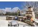 Backyard featuring a stone fireplace and outdoor lounge area at 3229 Autumn Ash Dr, Zionsville, IN 46077