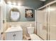 Updated bathroom featuring a glass shower door and modern vanity at 3229 Autumn Ash Dr, Zionsville, IN 46077