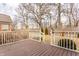 Spacious back deck with white railing, overlooking a well-maintained lawn and a wood privacy fence at 3560 Cardinal Way, Carmel, IN 46074