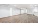 Finished basement features modern flooring, lighting, and bonus wet bar area at 3560 Cardinal Way, Carmel, IN 46074