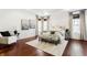 Bright and inviting main bedroom with hardwood floors, natural light, and stylish decor at 3560 Cardinal Way, Carmel, IN 46074