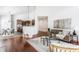 Bright living space seamlessly connects living, dining, and kitchen for easy entertaining at 3560 Cardinal Way, Carmel, IN 46074