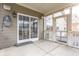 View of peaceful screened in porch with ceiling fan at 3560 Cardinal Way, Carmel, IN 46074