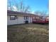 Spacious backyard features a deck, mature trees and ample lawn space for outdoor enjoyment at 3841 Monica Ct, Indianapolis, IN 46226