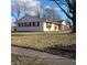 Charming front yard with lush lawn and a well-maintained exterior at 3841 Monica Ct, Indianapolis, IN 46226