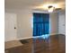 Inviting living room with wood flooring, stylish curtains, and a ceiling fan for added comfort at 3841 Monica Ct, Indianapolis, IN 46226
