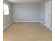 Neutral-toned living room with tile floors and a bright, airy ambiance with natural light at 3841 Monica Ct, Indianapolis, IN 46226