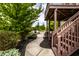 Backyard with a paved walkway and stairs leading to an outdoor lounge area at 3905 Pelham Rd, Carmel, IN 46074