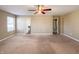 Bedroom with ceiling fan and two doors leading to other rooms, allowing seamless transitions at 3941 Planewood Dr, Indianapolis, IN 46235