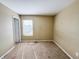 A standard bedroom, providing a neutral color scheme and a window at 3941 Planewood Dr, Indianapolis, IN 46235