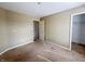 Bedroom with a standard layout, featuring neutral walls, and access to storage at 3941 Planewood Dr, Indianapolis, IN 46235
