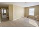 An adequately sized bedroom featuring a standard window and neutral walls at 3941 Planewood Dr, Indianapolis, IN 46235