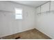 Bright walk-in closet offering ample storage solutions at 3941 Planewood Dr, Indianapolis, IN 46235