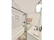 Modern bathroom featuring a white subway tiled shower, black fixtures, and a sleek vanity at 4224 Cornelius Ave, Indianapolis, IN 46208