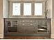 Close up of a built-in cabinet with display and drawer storage under a window at 4224 Cornelius Ave, Indianapolis, IN 46208