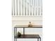 Interior home decor with a shelf, plant, statue, white walls, and white railings at 4224 Cornelius Ave, Indianapolis, IN 46208