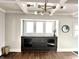 Bright dining room with built-in cabinet, natural light, and contemporary chandelier at 4224 Cornelius Ave, Indianapolis, IN 46208