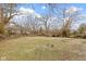 A spacious, expansive yard offering the potential for gardening, recreation, and outdoor enjoyment at 4457 N Kenmore Rd, Indianapolis, IN 46226
