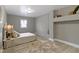 Serene bedroom with a plush bed, stylish decor, and soft natural lighting at 4457 N Kenmore Rd, Indianapolis, IN 46226
