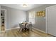 Charming dining area featuring a rustic 'Eat' sign and a window view at 4457 N Kenmore Rd, Indianapolis, IN 46226