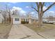 Inviting single-story brick home with a driveway and neatly kept lawn at 4457 N Kenmore Rd, Indianapolis, IN 46226