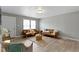 Modern living room featuring stylish furnishings, neutral tones, and sleek flooring at 4457 N Kenmore Rd, Indianapolis, IN 46226